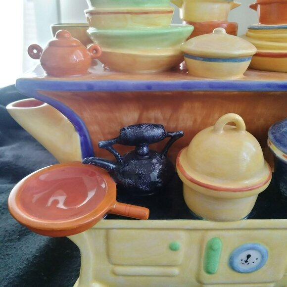 Department 56 Toot & Puddle Ceramic Stovetop Teapot With Colorful Cookware Desig - Picture 3 of 10